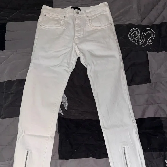 All white jeans made by Purple Brand